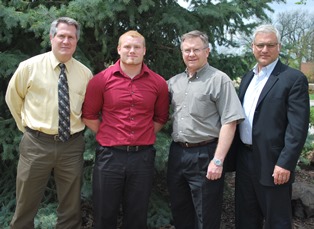 Interim Athletic Director Scott McClure, Tevis Linnebur, Mike Olson, Head Football Coach Manny Matsakis